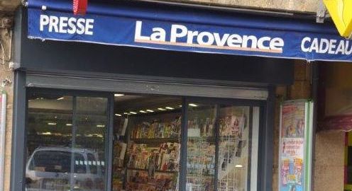 Chez le marchand de journaux